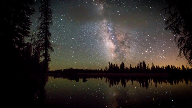night view over lake with stars